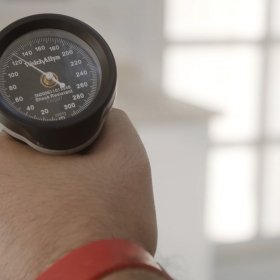 Veterinarian uses medical equipment